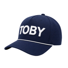 Load image into Gallery viewer, Black cap with a green and white 'TOBY' logo on a white background
